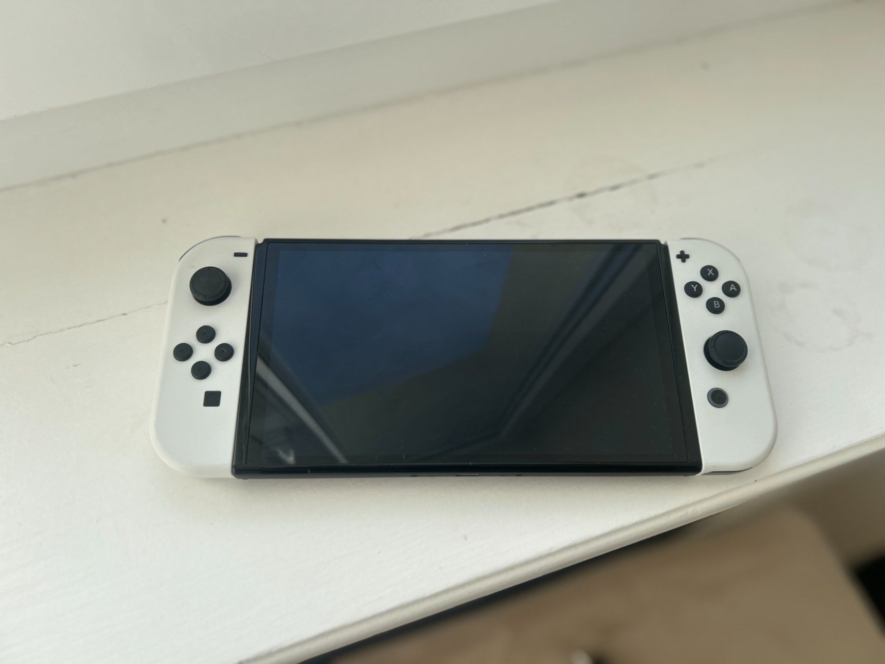 Nintendo Console: Nintendo Switch OLED blanche + 2 jeux, comme neuf! – Usato da Fleurier venduto da sar_rf88 2