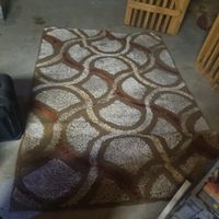 Teppich mit modernem Muster braun beige gebrauchter Zustand