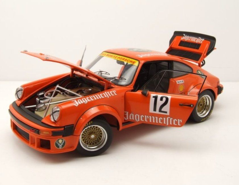 SCHUCO SH450034400 PORSCHE 934 RSR JAGERMEISTER 1:18 Modellino