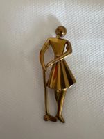 Vintage Brosche: Elegante Golferin-Brosche, Goldfarben.  ...