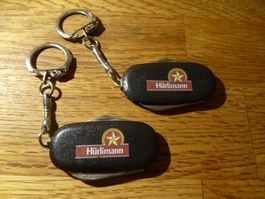 2x Schlüsselanhänger Hürlimann Sachmesser Flaschenöffner