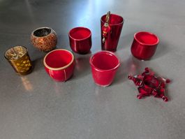 Rote Kerzenständer