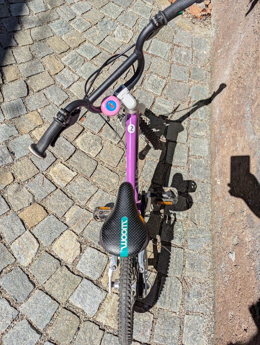 Woom Bike 2 (14 Zoll) lila - Klingel, Fahrradstnder inkl. (Gebraucht) in  Maienfeld fr CHF 290  nur Abholung auf Ricardo kaufen