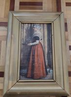 Wandbild mit Frauenmotiv in Goldrahmen gebraucht