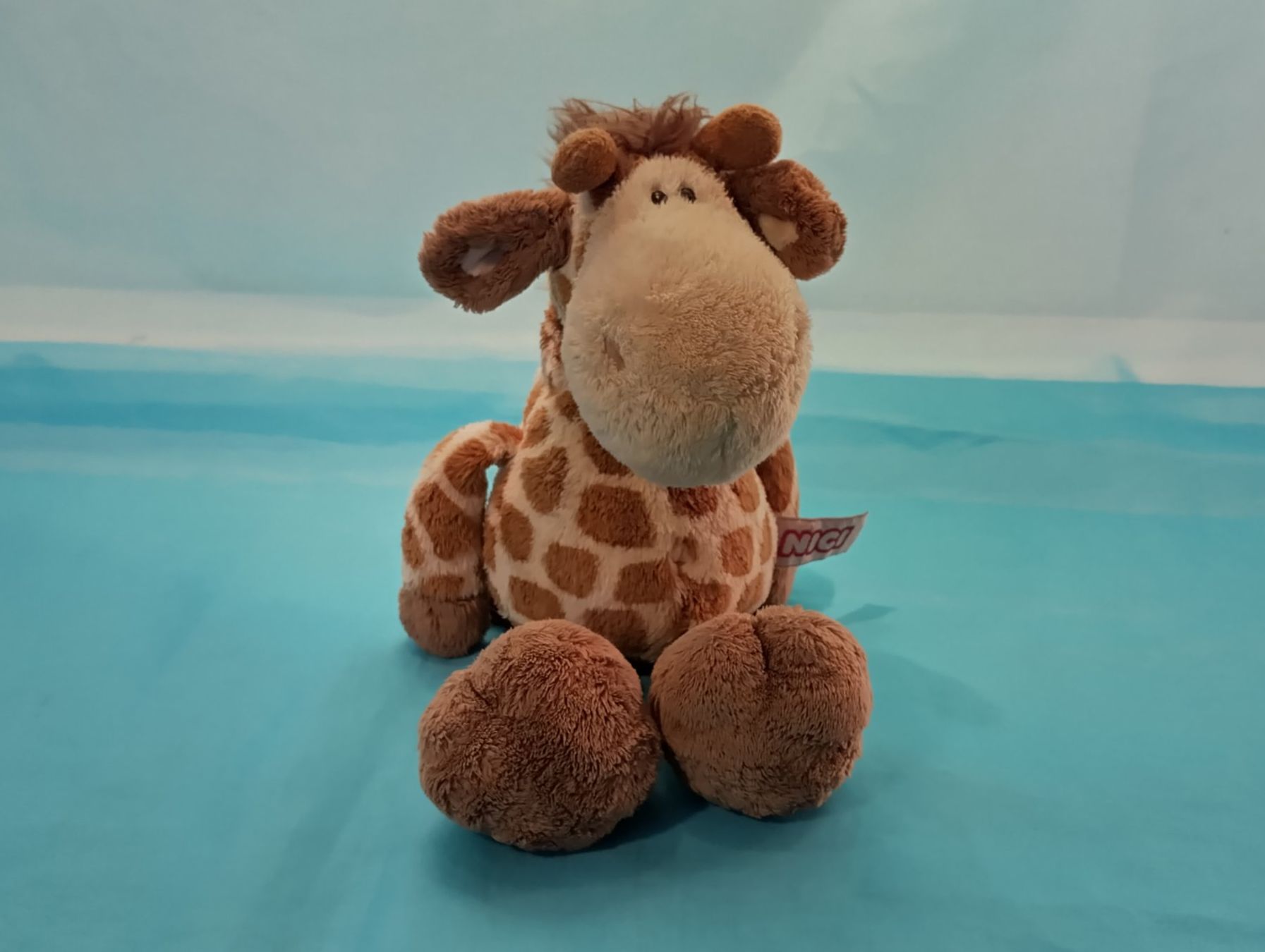 Nici Spielzeuge: NICI Giraffe. L: 30cm – Gebraucht aus Bellach von JingleCherry
