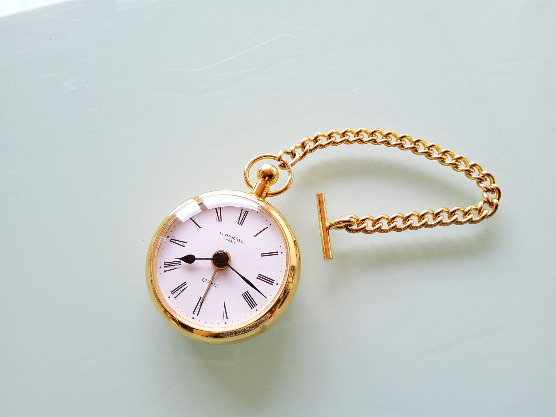 Orologi da terra & Orologi da parete: Pendulette de voyage avec chainette Lancel  – Usato da Malleray venduto da Broc-Mo 2