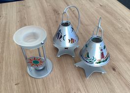 2 Teelichter in Laternen-Form  +  1 Teelicht für Duftöl