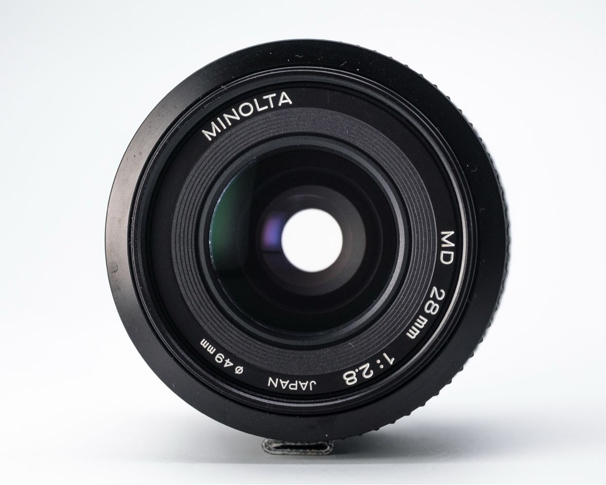 Minolta Objektive: Objectif MINOLTA MD 28mm 1:2.8 – Gebraucht aus Genève von Supablaz 3