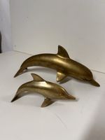 Paire de dauphins en laiton décoratifs à poser