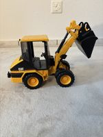 Spielzeug Bagger Radlader CAT bespielt guter Zustand