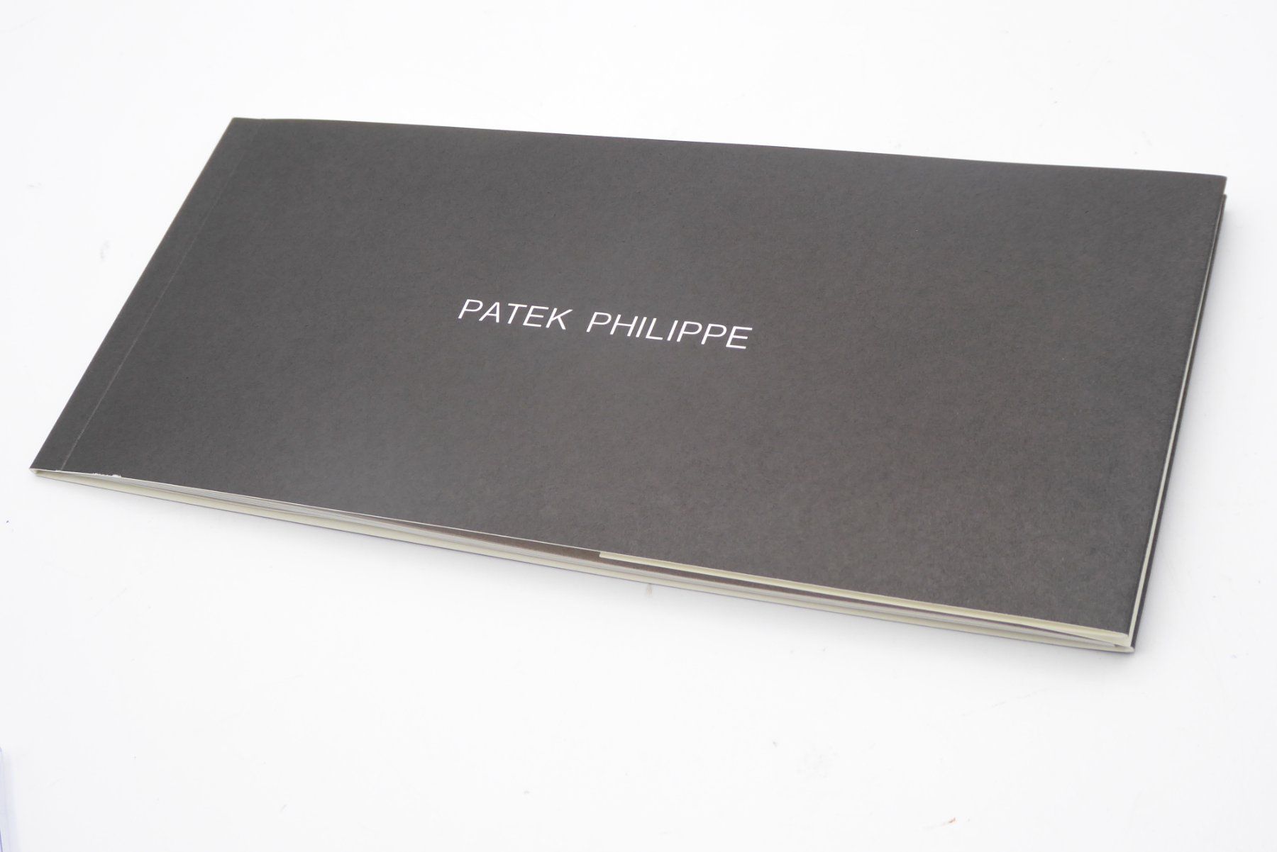 Patek Philippe Orologi: Patek Philippe Nautilus Booklet Vintage set 12.73 – Usato da Geneve venduto da adr_xk6n 2