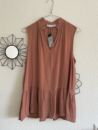Neuf: Top sans manches Primark, taille 38, couleur rouille.