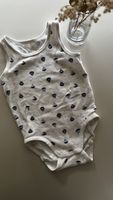 Baby bodysuit with sailboat print