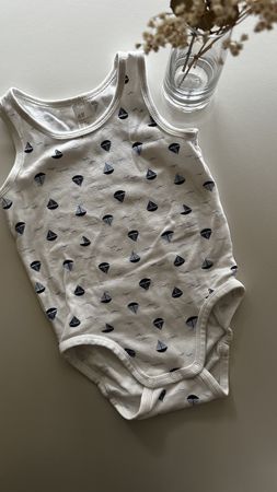 Baby bodysuit with sailboat print