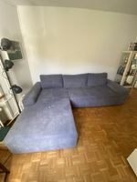 Graues Ecksofa mit Bettfunktion & Stauraum