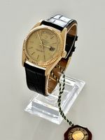 Rolex Day-Date  18K Gelbgold   Tag /English tag