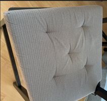 2 grey chair pilows