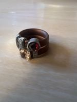 1 bague fantaisie selon photo