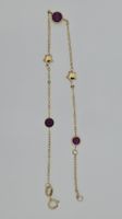 14 Karat Gelbgold Armkette  mit Rhodolith & Sternen