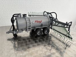 Bruder Fliegl Fasswagen Güllefass Modell grau bespielt