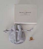 Élégant Pin's Baume & Mercier plaqué or - Accessoire chic