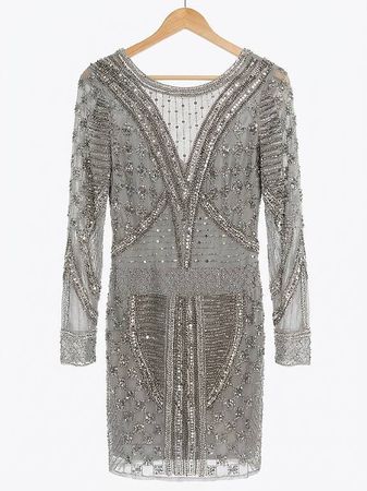 Vestito argentato elegante con paillettes e strass 