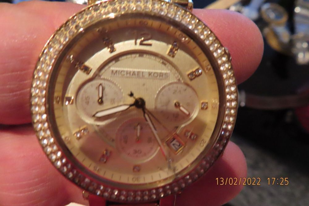 Batterie montre michael discount kors