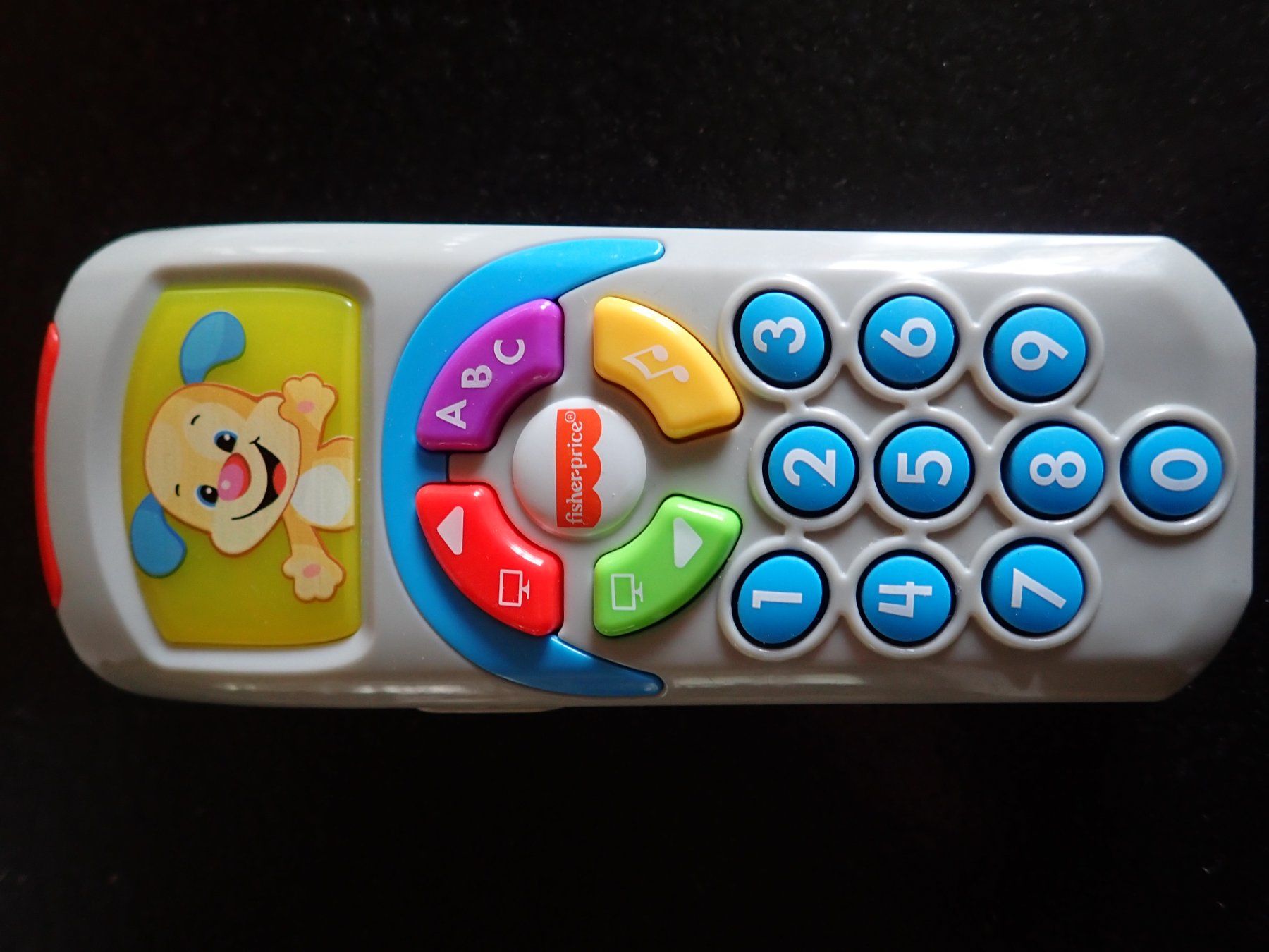 Fisher-Price Spielzeuge: Dès 9 mois : télécommande Puppy – Neu (gemäss Beschreibung) aus Petit-Lancy von camping_car