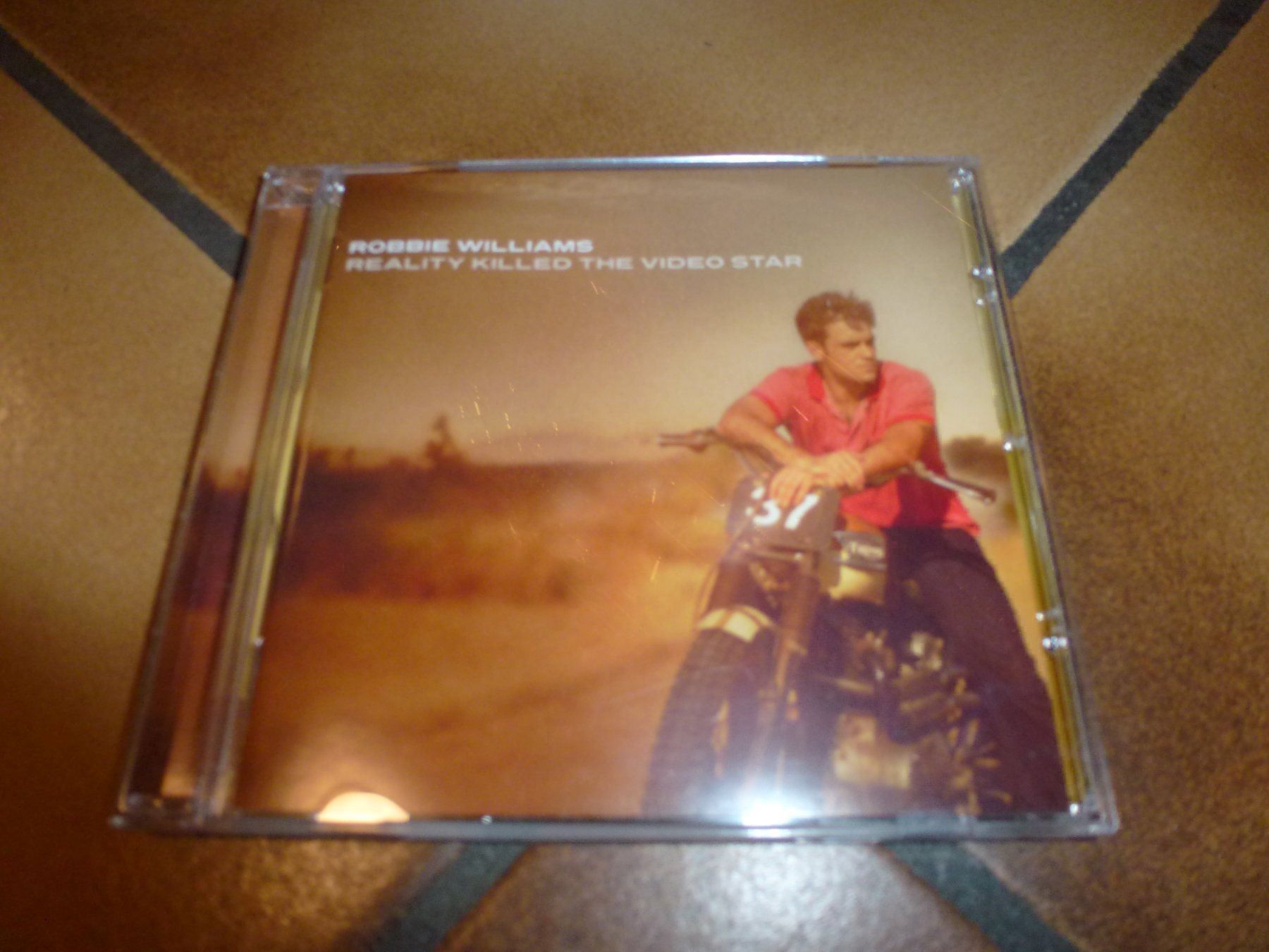 CD: Robbie Williams - Reality Killed the CD – Usato da Olten venduto da Disc-Ausverkauf