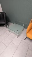 Gebrauchter Glas- und Metalltisch mit 2 Ablagen
