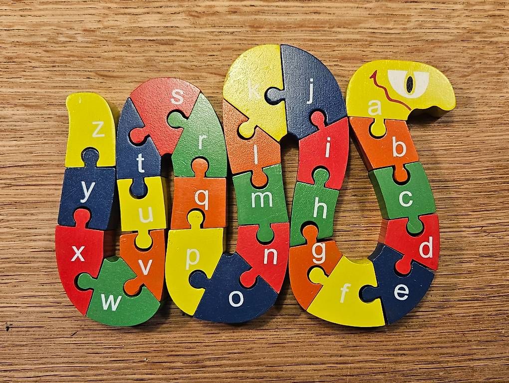 Puzzles: Puzzle en bois serpent alphabet et chiffres – Gebraucht aus Renens VD von arochat