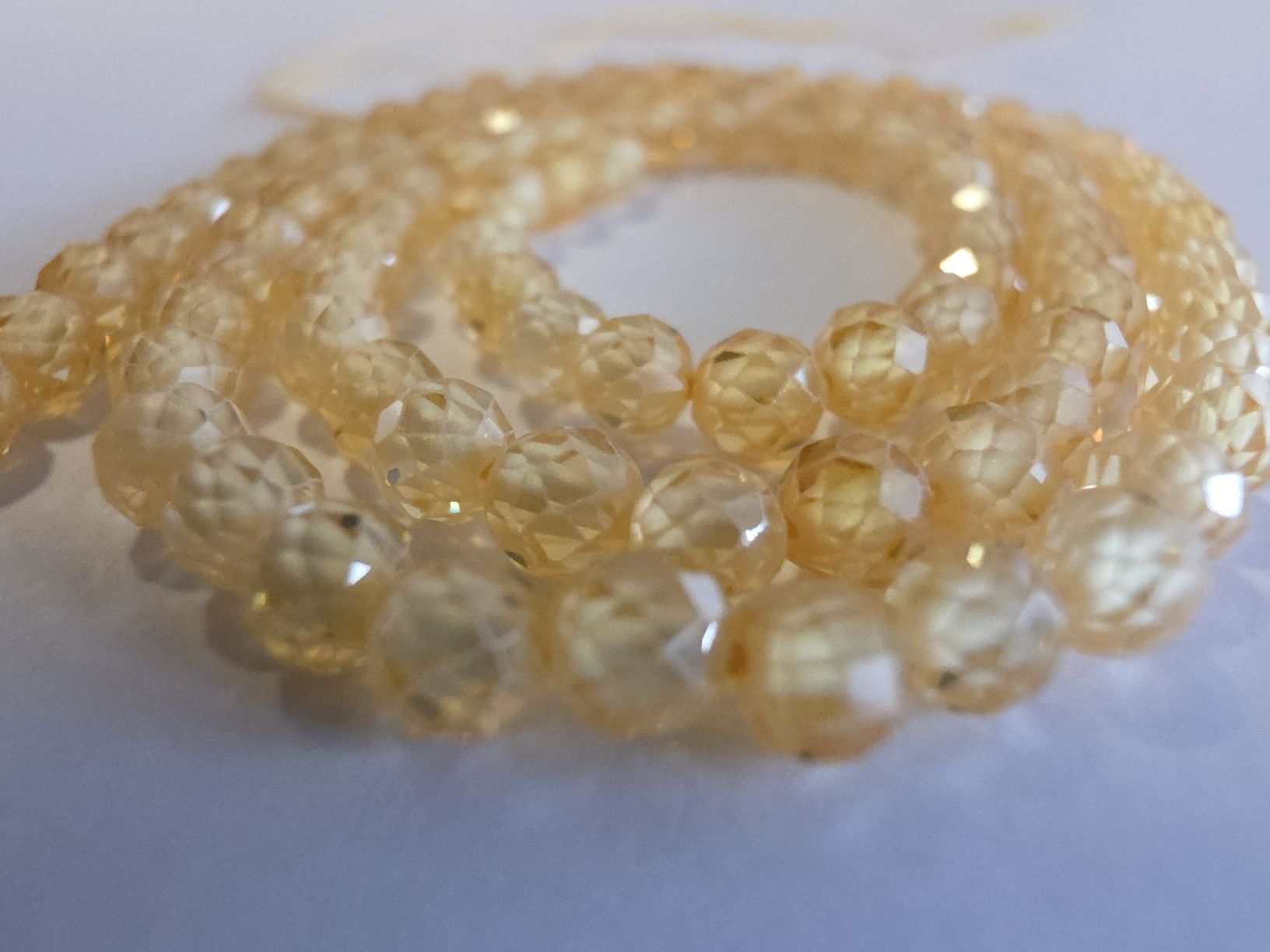 Minerali & Pietre curative: Zirkon Gelb facettiert 4mm. Strang – Nuovo e nell'imballaggio originale da Menziken venduto da Mirager 2