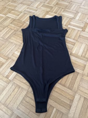 Damen Body ärmellos schwarz 