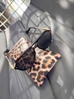 Elegante Sonnenbrille Schwarz-Gold inkl. Leoparden-Etui
