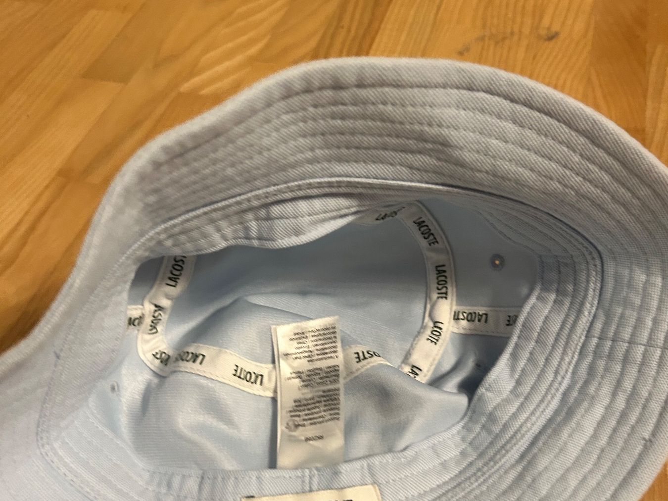 Lacoste Copricapi, berretti & cappellini: Lacoste Hut Hellblau, Top Zustand, Gr. L – Nuovo (secondo la descrizione) da Brüttisellen venduto da ThommyK 1