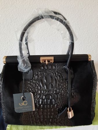Tasche. Leder.