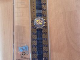 montre Swatch collection 100 ans mouvement olympique