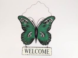 Schmetterling mit Welcome-Schild