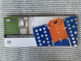 Planche Système pliage rapide habits linge T-Shirt maison