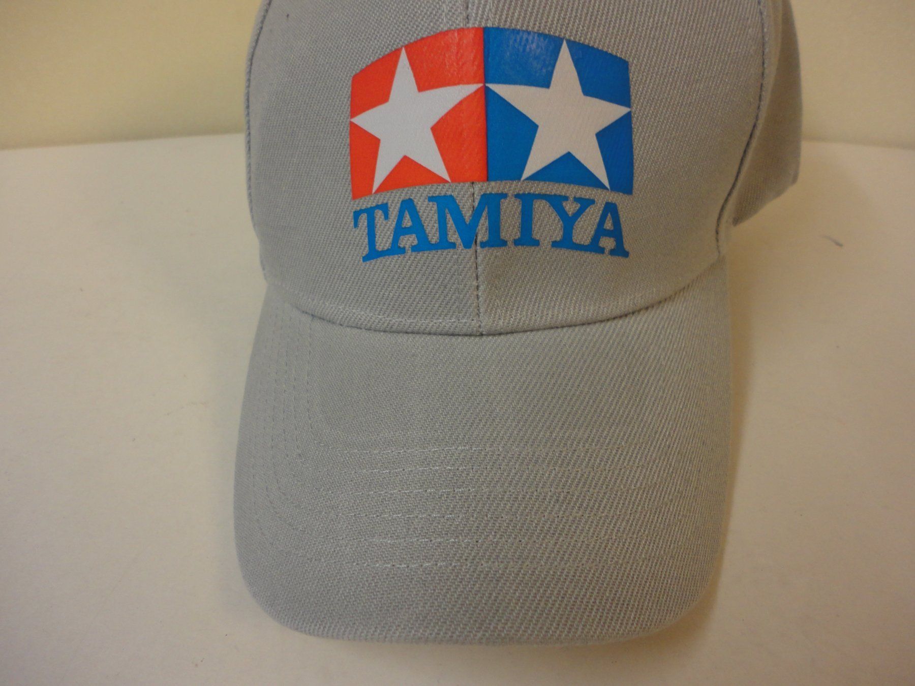 Modellismo RC: Tamiya Cap, grau, neu. Ideale Kopfbedeckung! – Nuovo e nell'imballaggio originale da Horgen venduto da RcModell 2