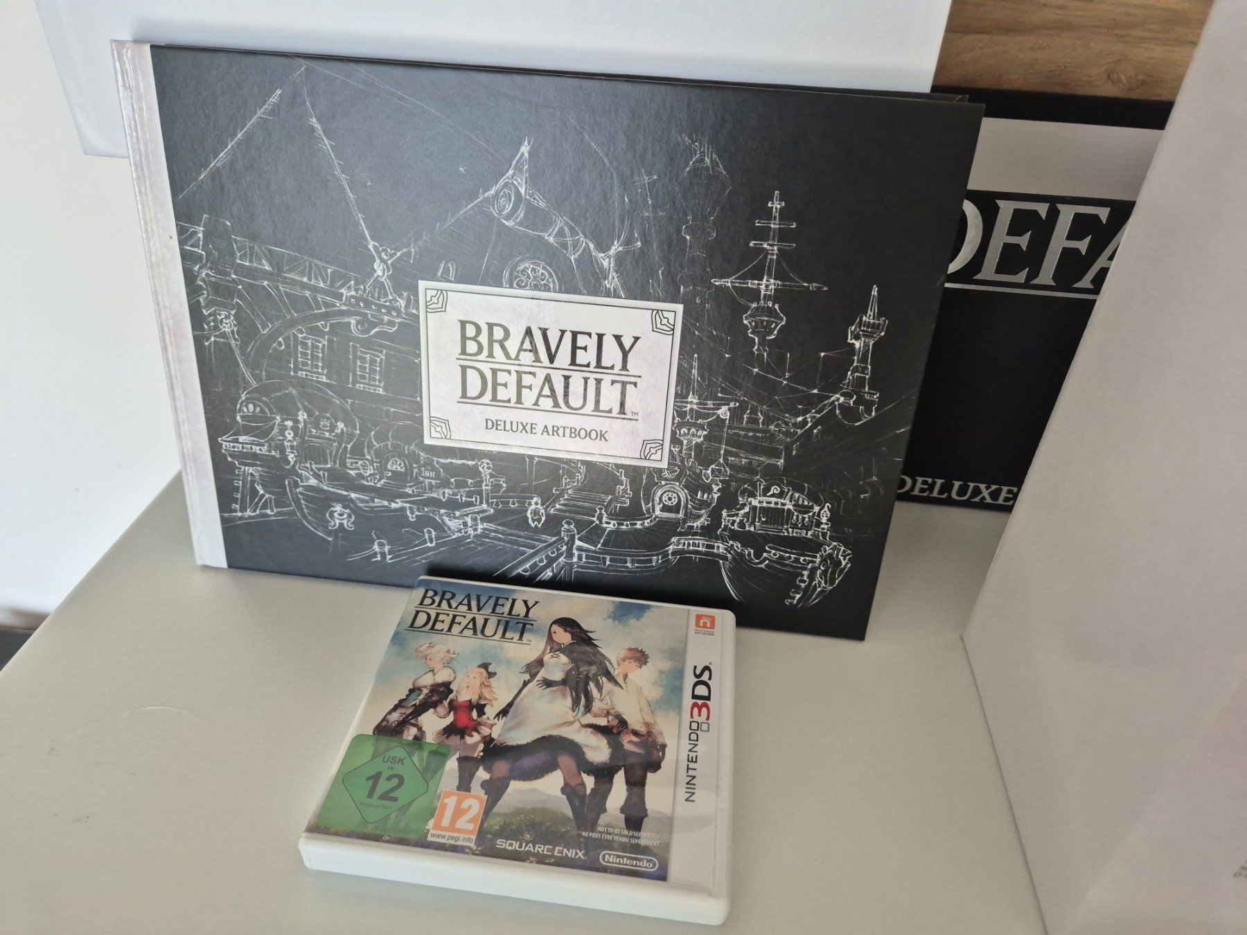 Jeux: Bravely Default Deluxe Edition Nintendo 3DS Spiel + Figur – Neuf (Voir description) à Bassersdorf par retrolab 1