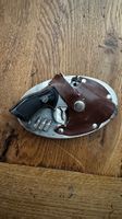 Gürtelschnalle mit Revolver-Feuerzeug