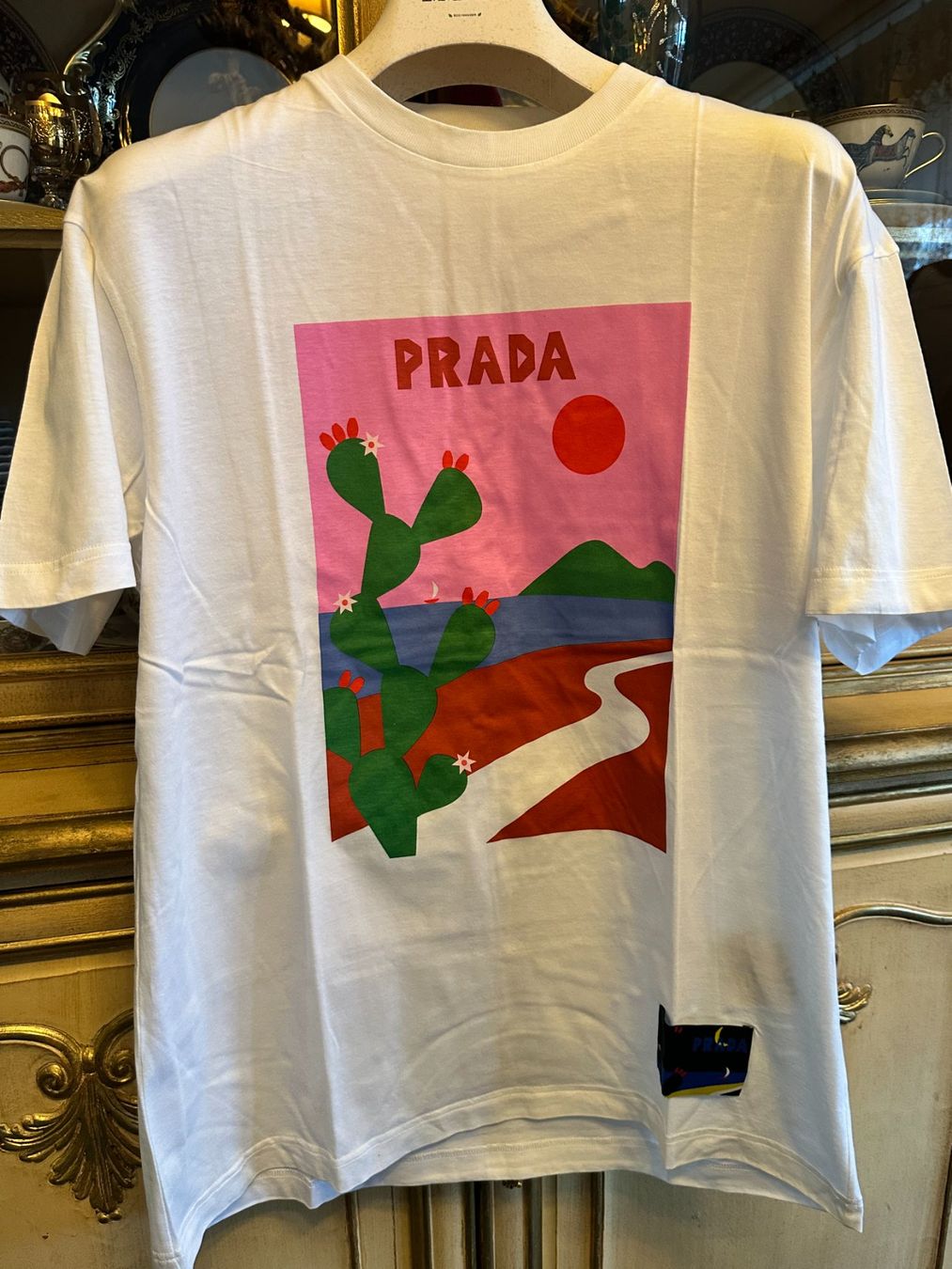 Prada T-shirt: Prada Print T-Shirt logo print size L – Usato da Mont-sur-Lausanne venduto da jolieresale