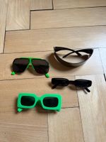 4 Sonnenbrillen grün und schwarz