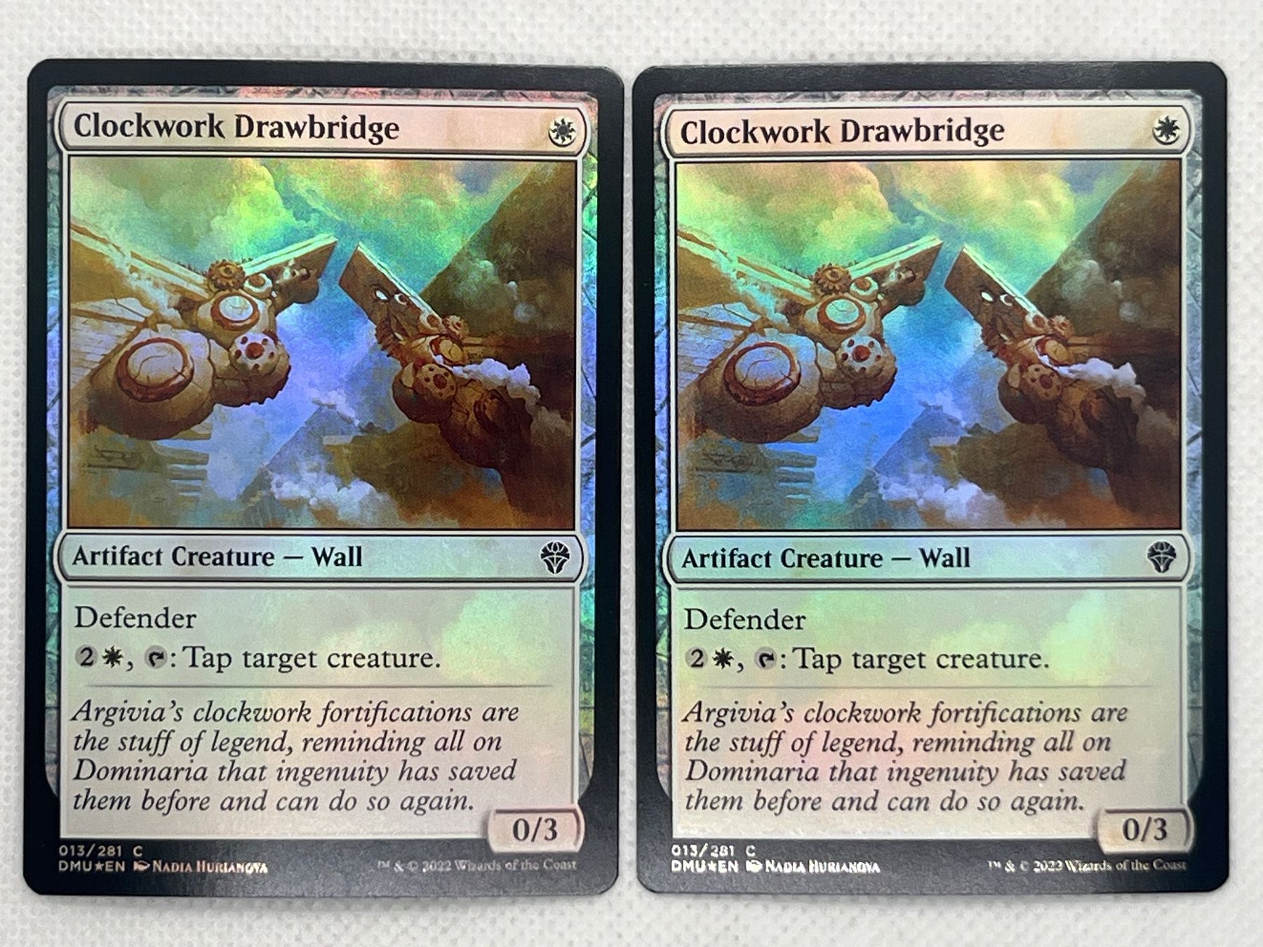 Magic The Gathering Carte collezionabili: MTG Clockwork Drawbridge DMU 13 Englisch Common Foil 2x – Usato da Hinterkappelen venduto da Kim1992