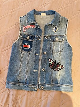 gilet jeans con applicazioni