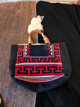 Star Mela lined blue red key embroidered tassel tote bag
