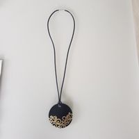 collier pendentif réversible avec montre TISSOT