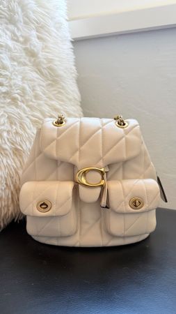 Coach Leder-Rucksack in Cremeweiss mit goldfarbenen Details