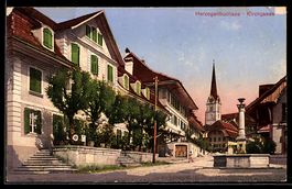 AK Herzogenbuchsee, Kirchgasse mit Brunnen und Blick zur Kir